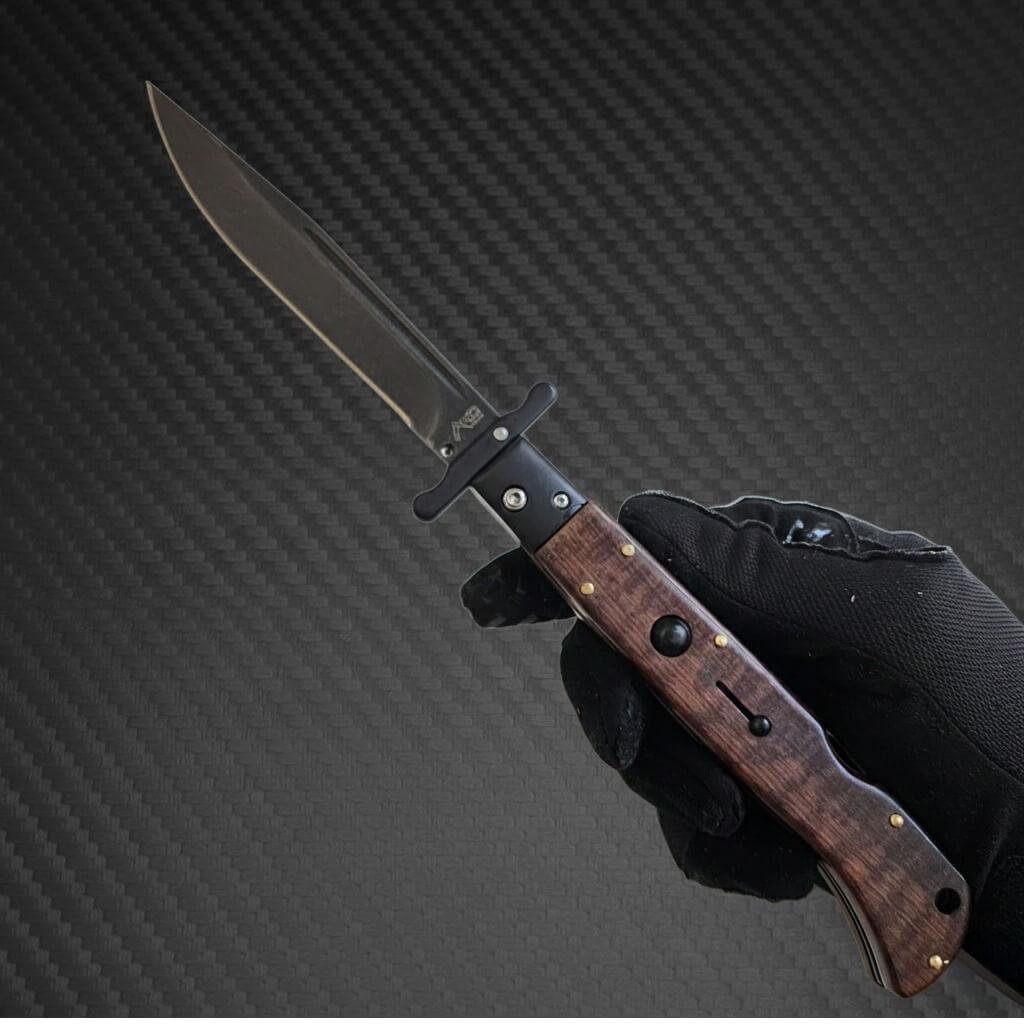 Roma Swinguard AKC 11 Tactical Snakewood Edition knife with 4.62 black blade for precision and durability