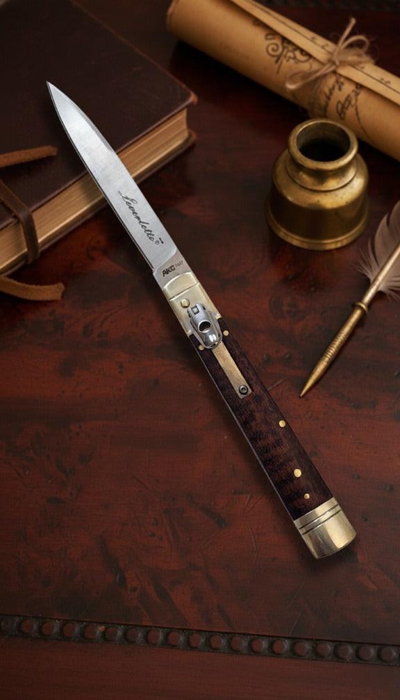 Italian Leverlock knife with 9-inch blade and elegant snakewood handle, featuring satin plain finish for durability