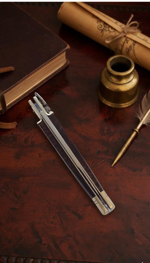 Italian Leverlock knife with 9-inch blade and elegant snakewood handle, featuring satin plain finish for durability