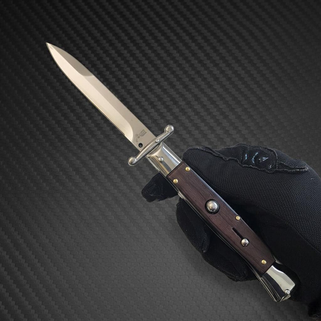 Luxury AKC Swinguard 9 Automatic Italian Stiletto with polished Cocobolo handle and sleek bayonet design
