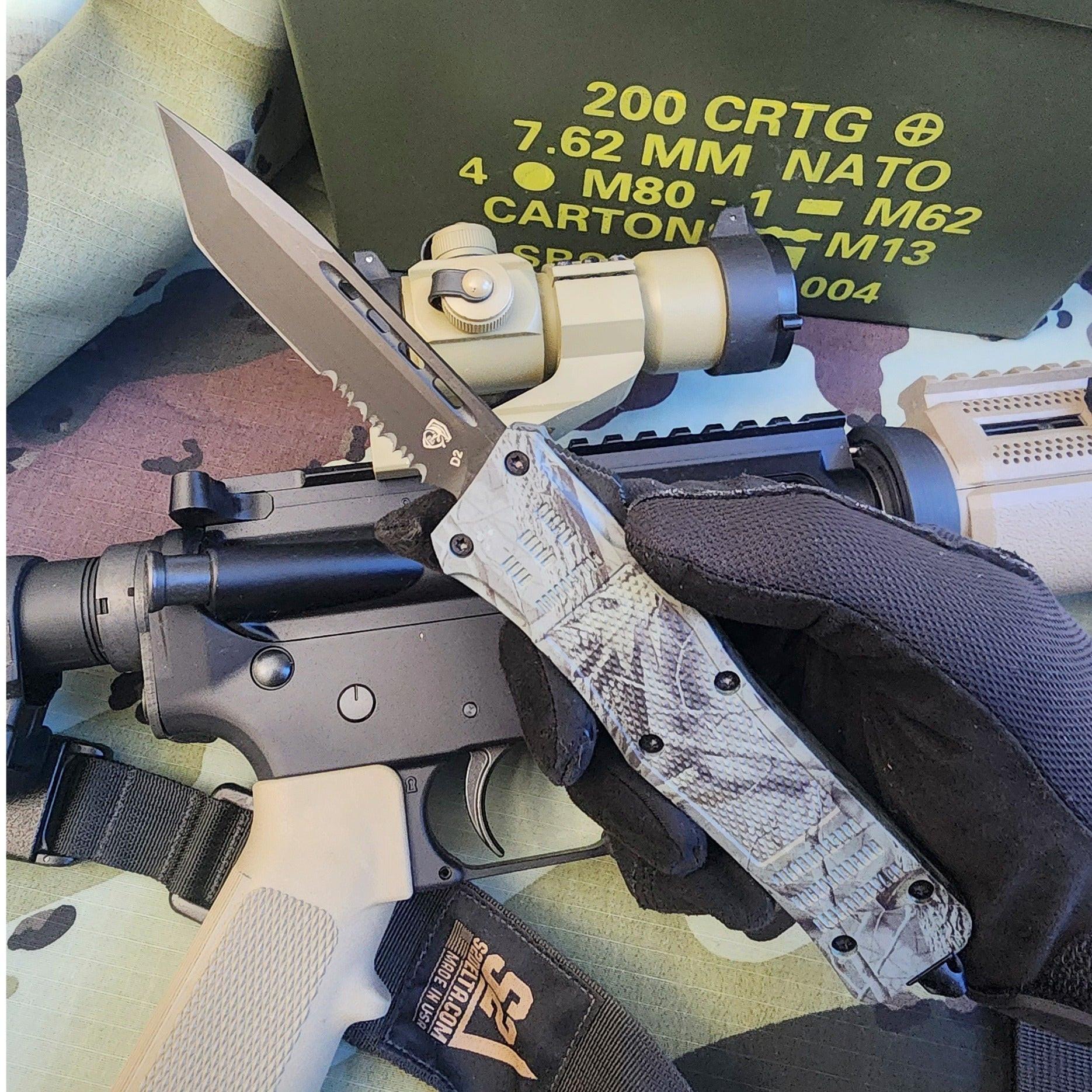 Venom 4-TR Gen 5 OTF knife in Woodland camo with black tanto blade, durable and tactical Venom knife for outdoor use