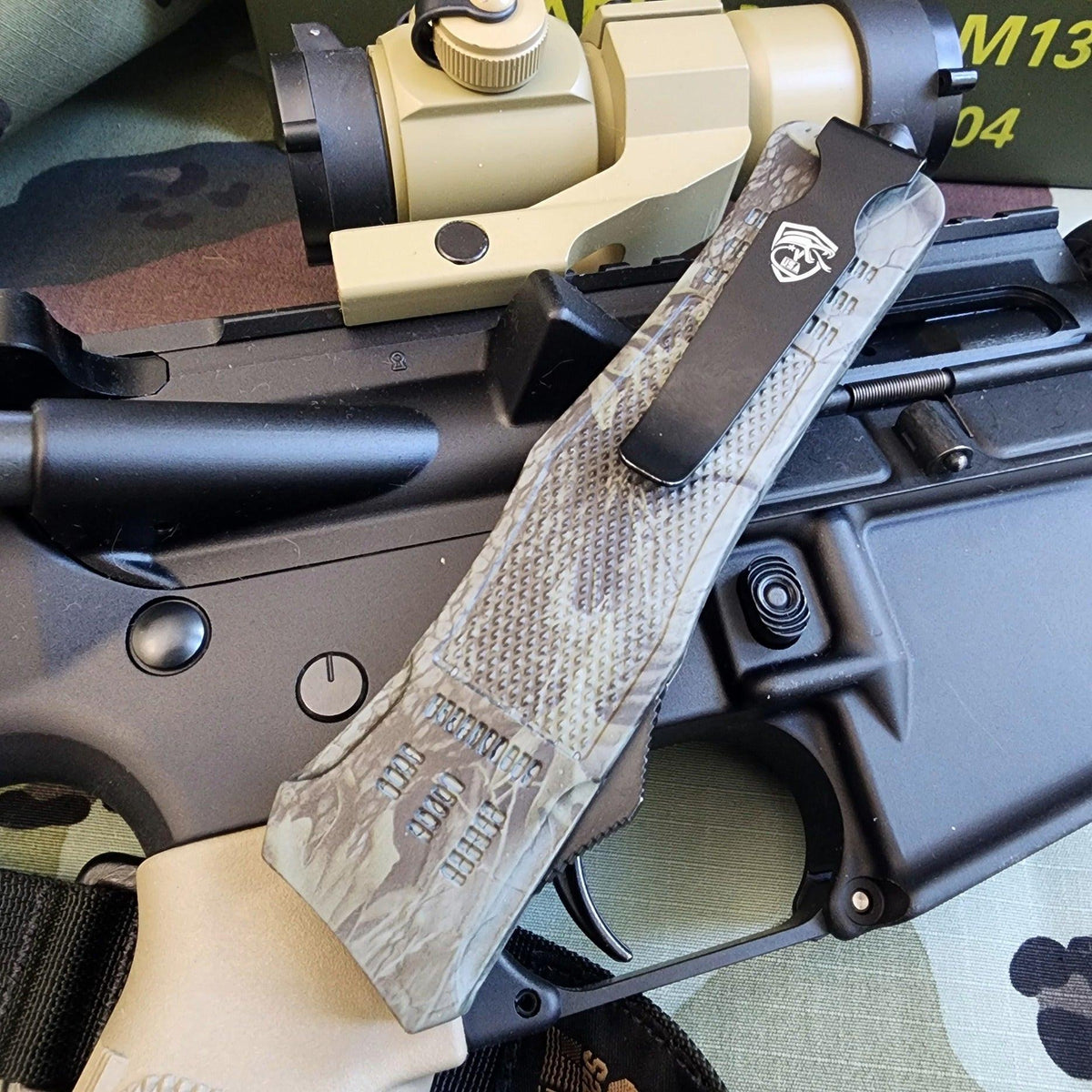 Venom 4-TR Gen 5 OTF knife with satin DP par ser blade, woodland design highlighting tactical venom features