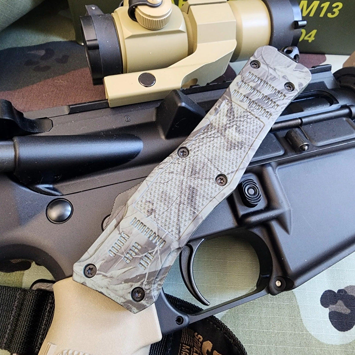 Venom 4-TR Gen 5 OTF knife with satin DP par ser blade, woodland design highlighting tactical venom features