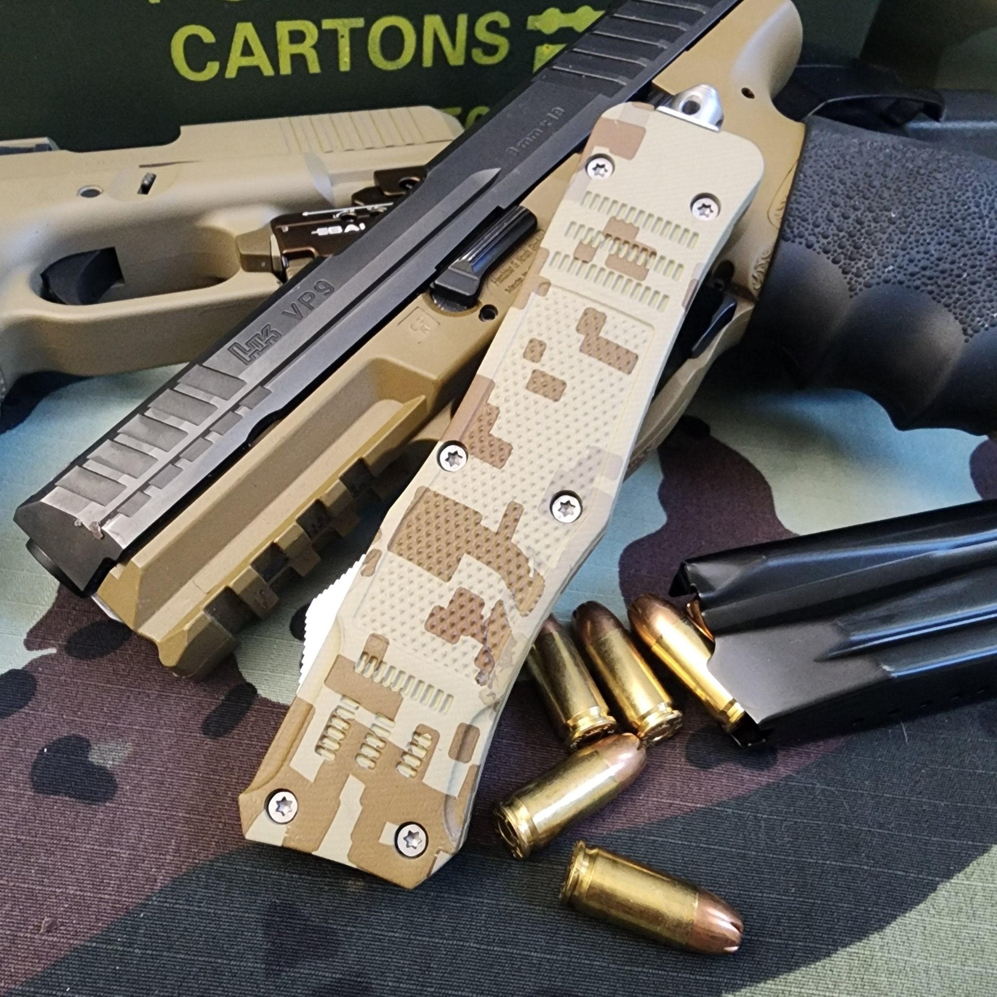 Camouflage knife with bullets on a camouflage background