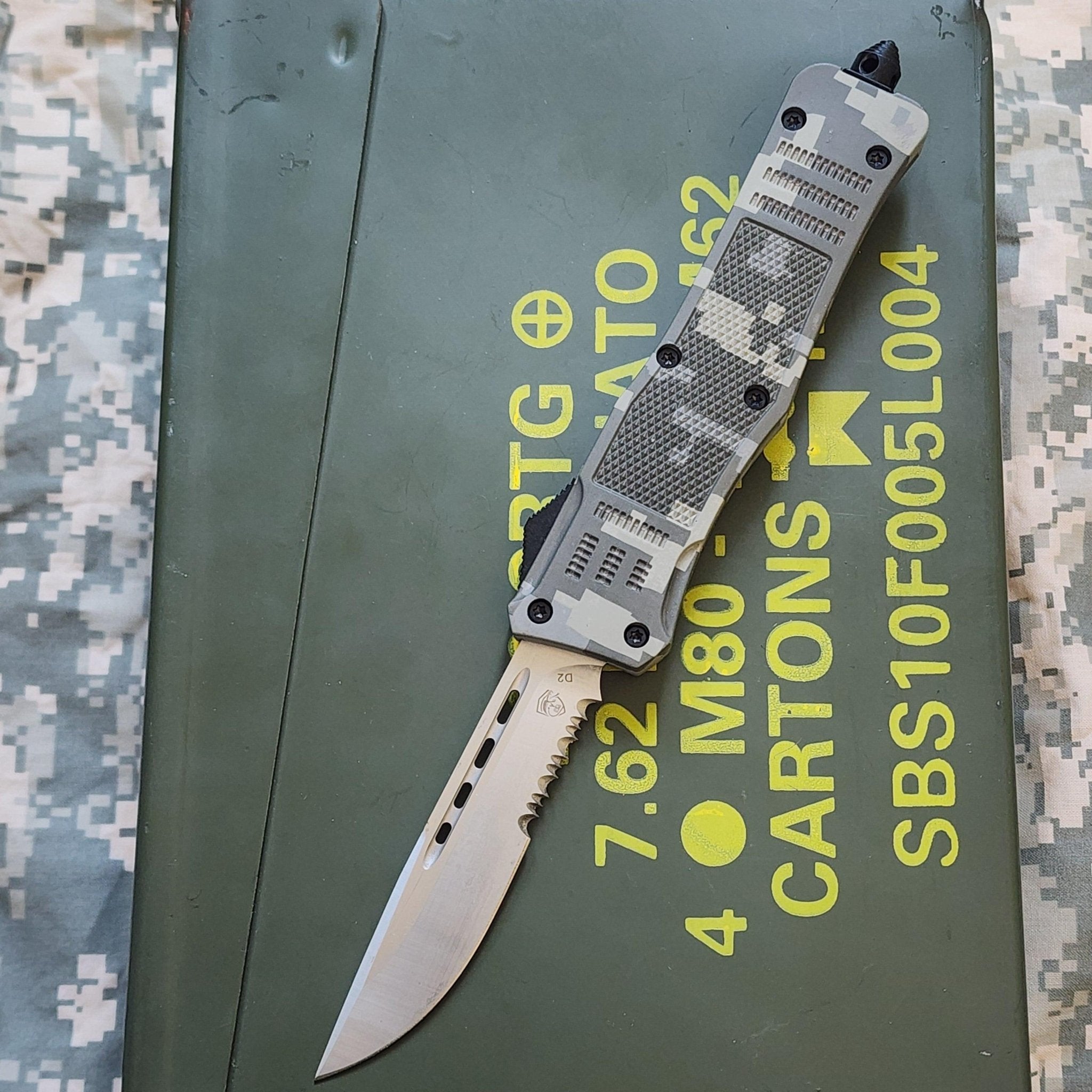 Venom4TRELITETacticalOTFKnife-ACUCamo_SatinDPParSer3_1_e7718c16-f54e-4da6-b7ea-75b931ec8b0e