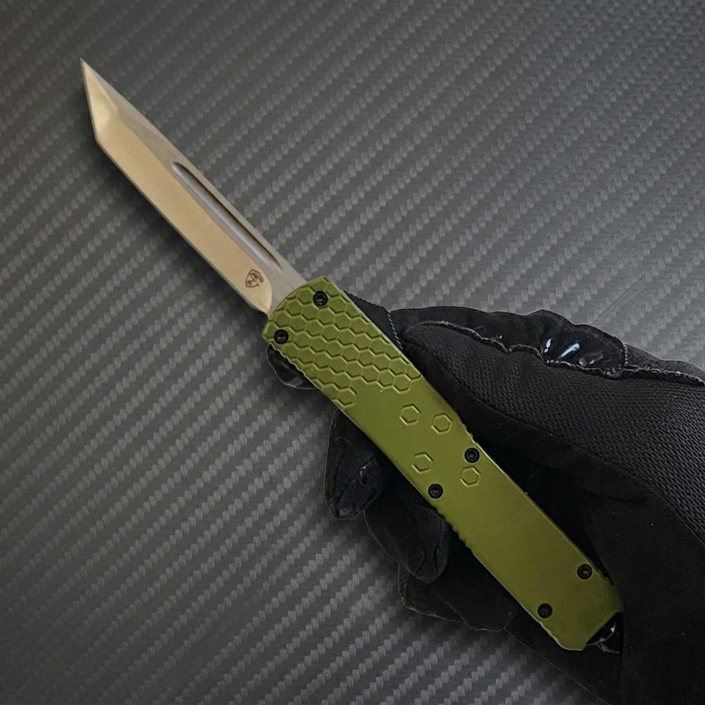 Venom Hex Force OTF tactical knife with satin tanto 3.25-inch blade in OD green, ideal for precise outdoor use