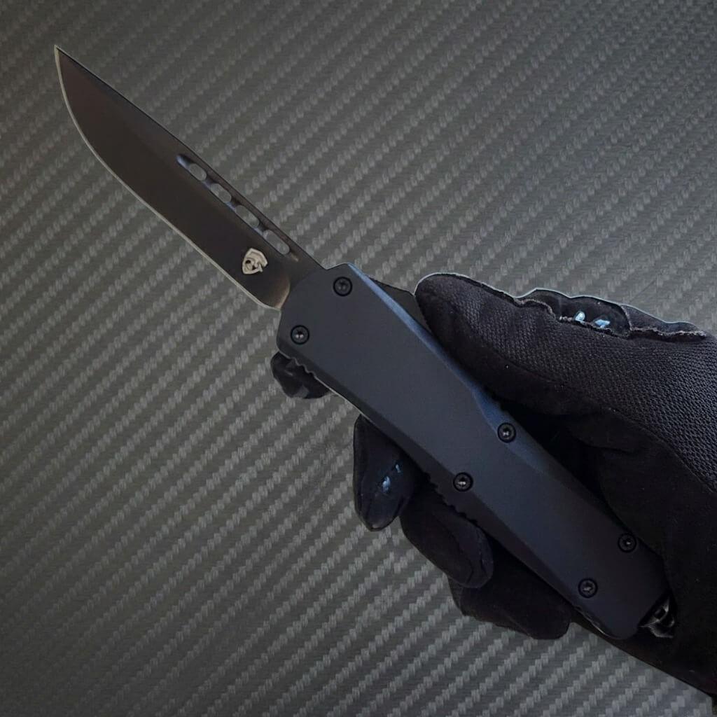 Venom S1 Delta D/A Automatic OTF Knife in sleek black DP finish, a luxury blend of precision and elegance