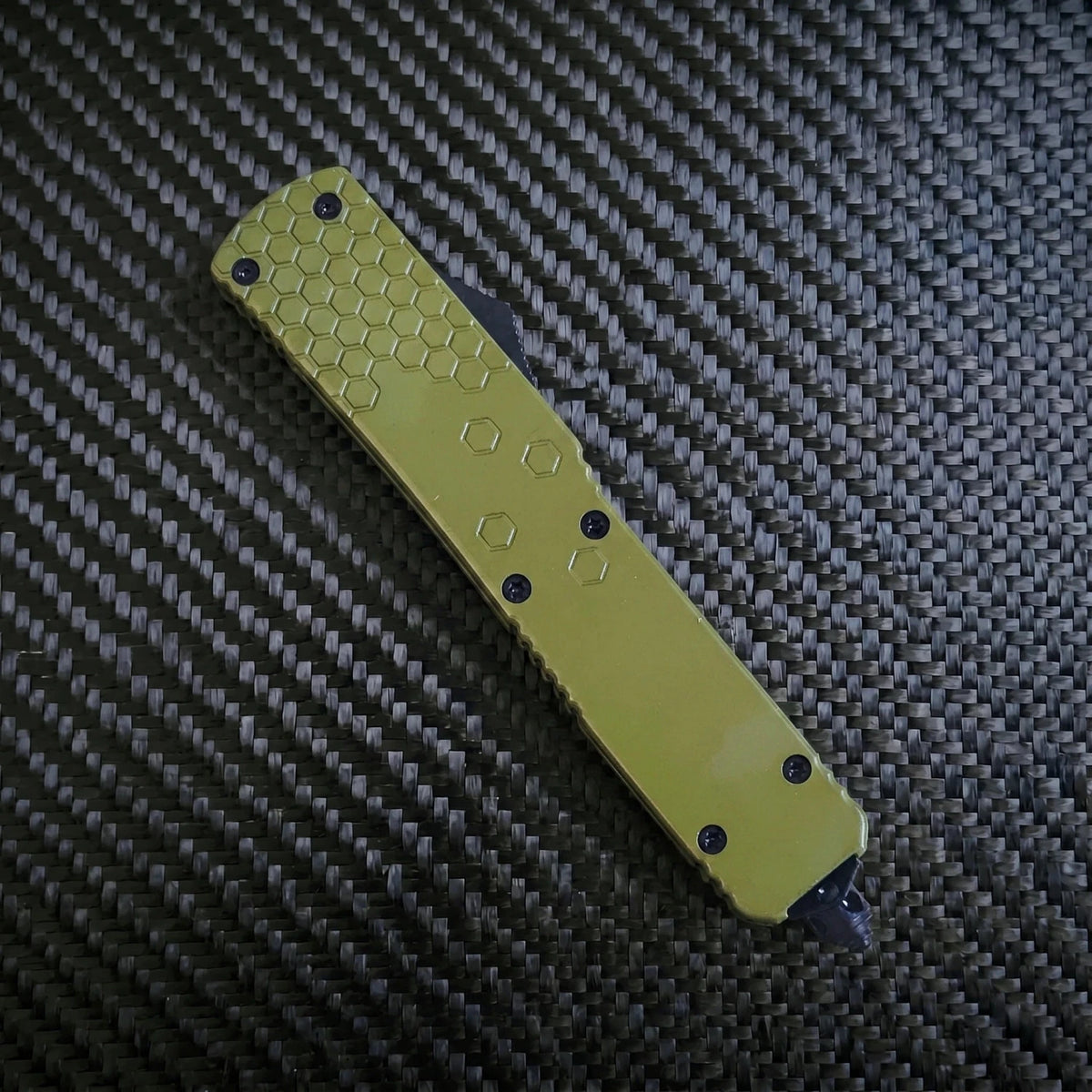 Venom Hex Force OTF knife in OD Satin Spartan 3.25 showcasing luxury design, precision craftsmanship, and unique venom-inspired aesthetics