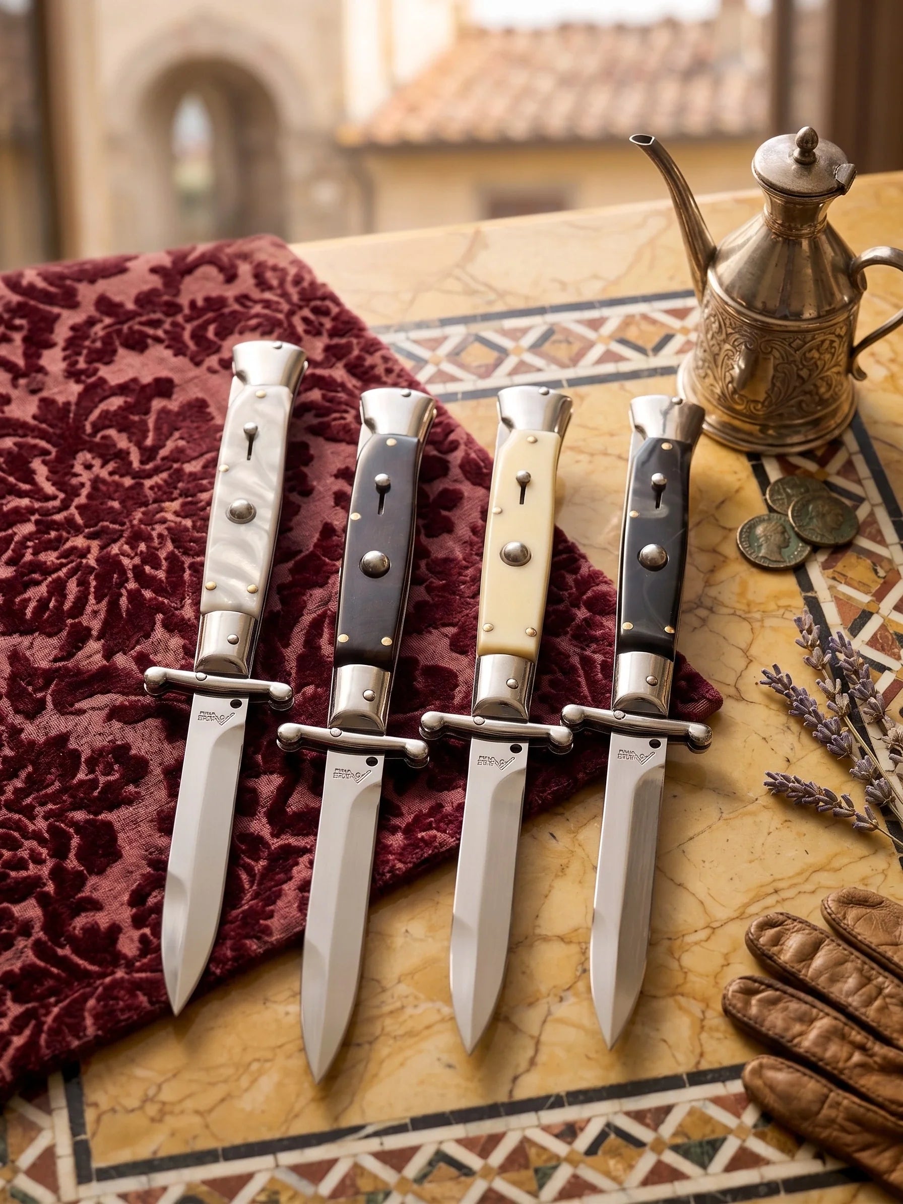 Italian Swingiard Automatic Switchblade Knives on a table