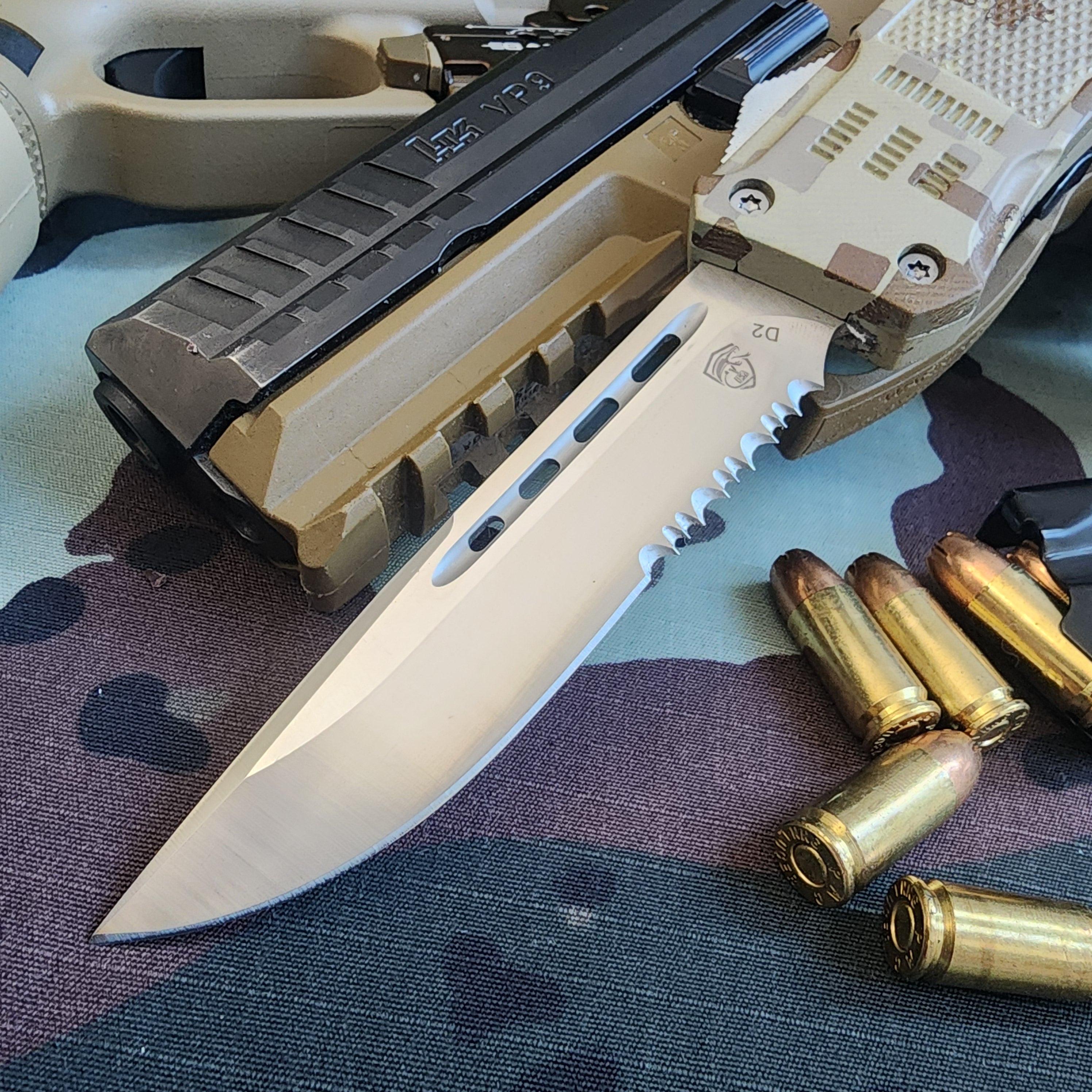 Fishing knife with camouflage handle and sheath, accompanied by bullets on a camouflage-patterned surface.