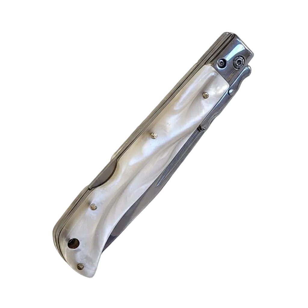 Elegant AKC 9 Italian Roma Swinguard Automatic in White Pearl, 3.75 Polished finish for sophisticated style