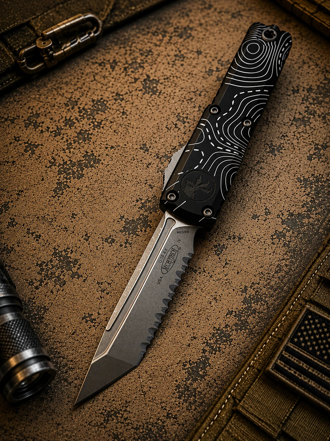 Microtech UTX-85 Gen IV OTF Automatic Knife – Black Topographic Handle | Stonewash Full Serrated Tanto M390MK® | 12334-12TP