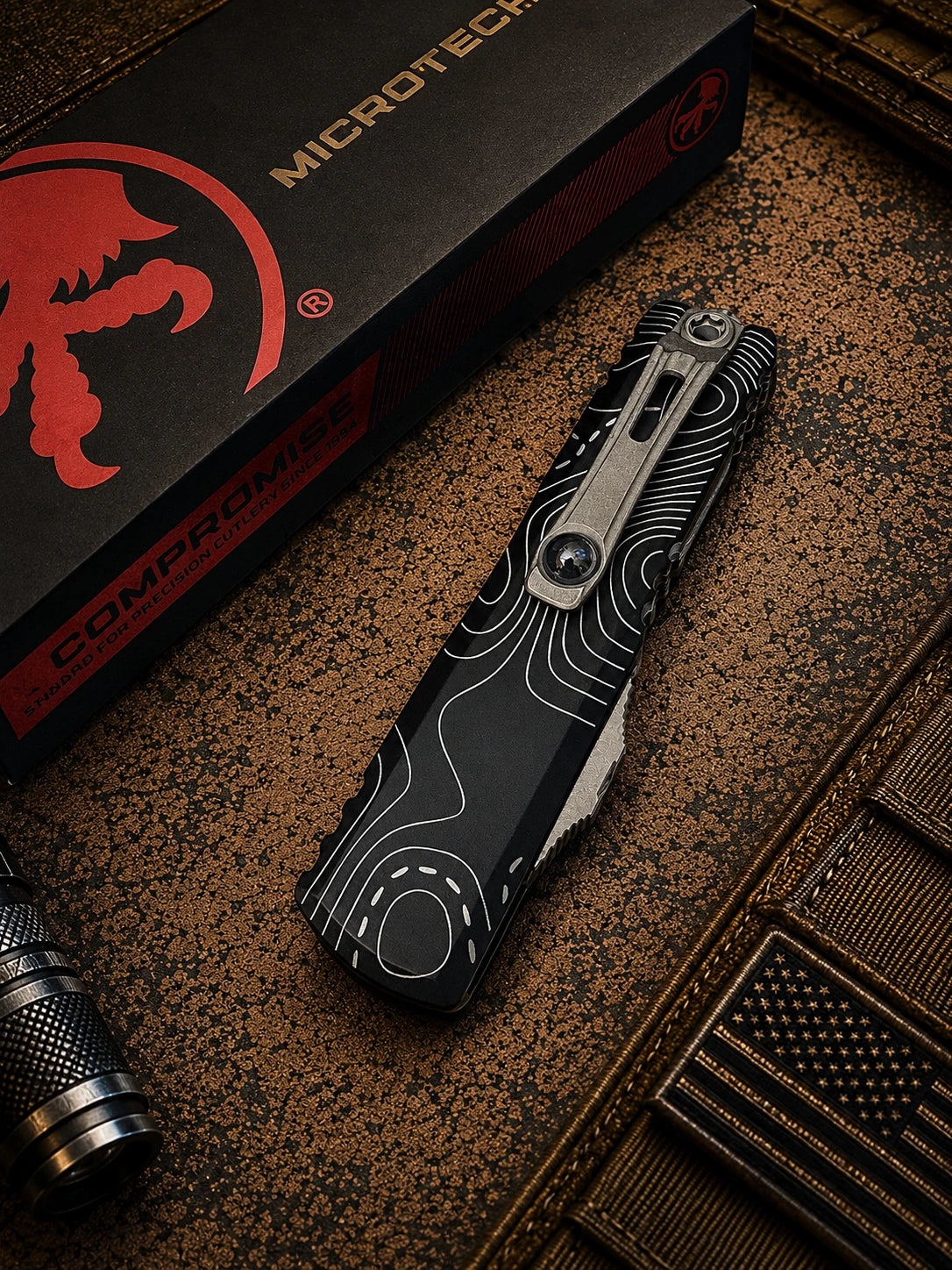 Microtech UTX-85 Gen IV OTF Automatic Knife – Black Topographic Handle | Stonewash Full Serrated Tanto M390MK® | 12334-12TP