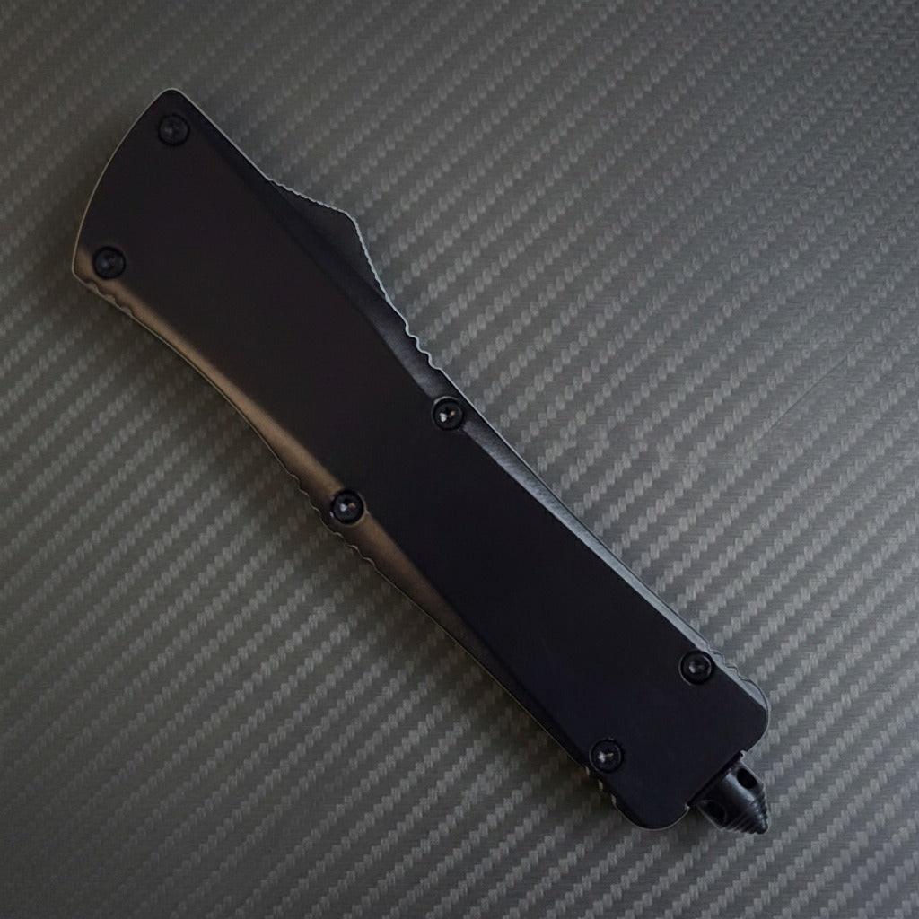 Sleek V30R Tactical D/A Automatic OTF knife in black, blending luxury with precision and tactical durability