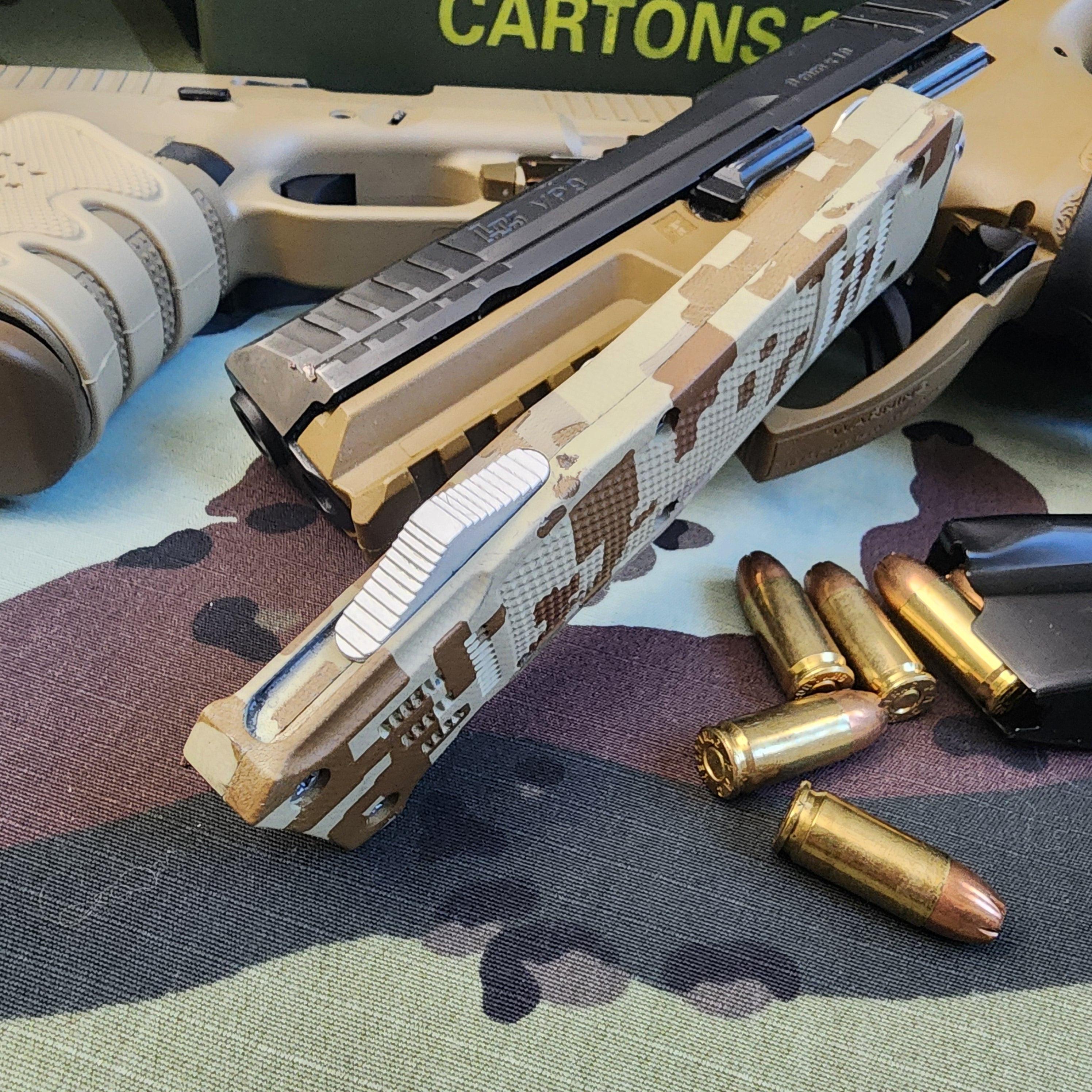 Camouflage handgun with bullets on a camouflage surface