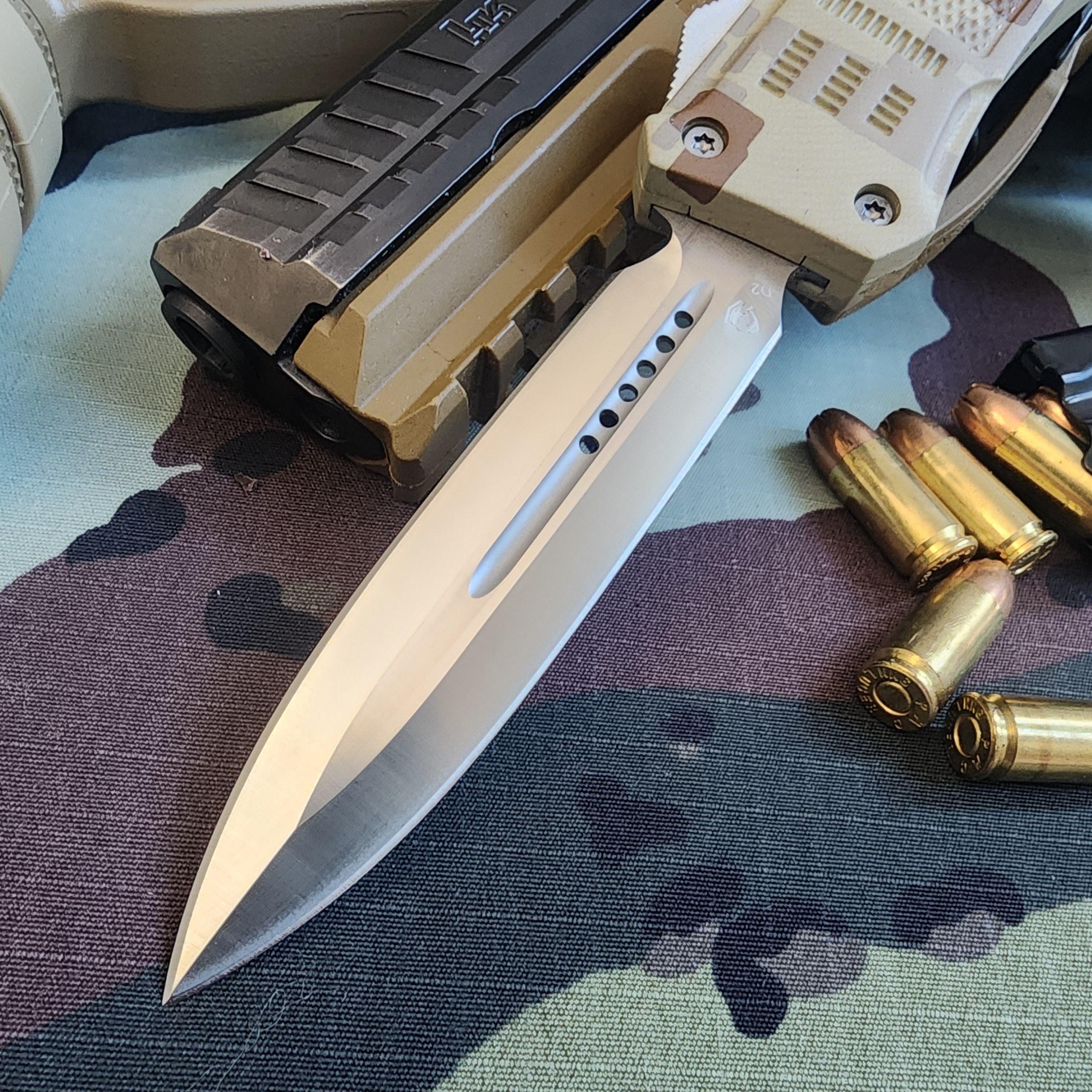 Folding knife with a bullet on a camouflage-patterned surface