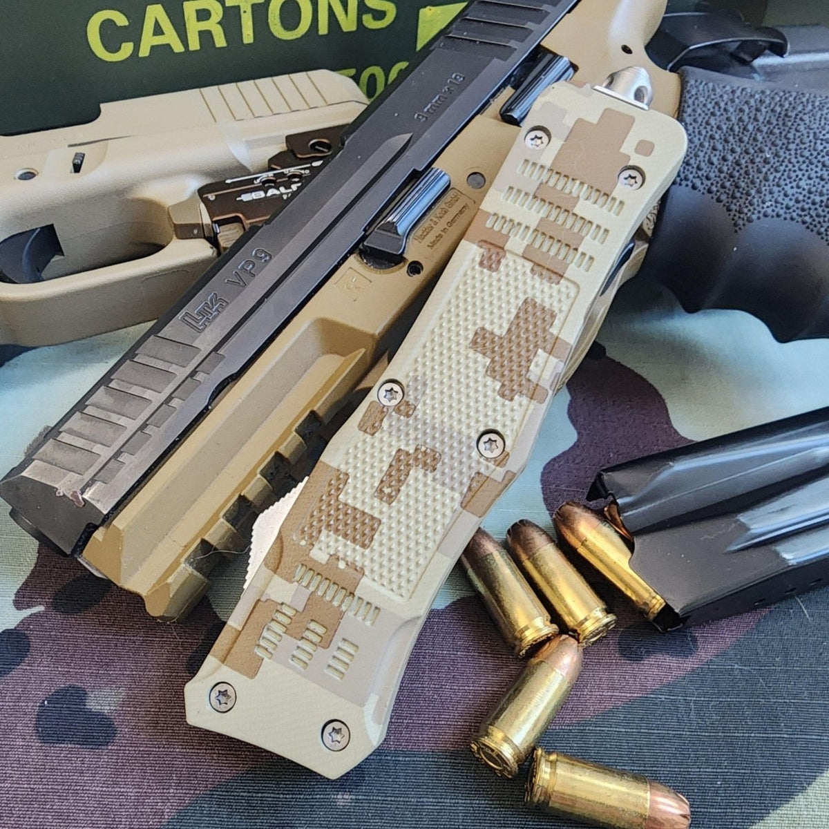 Camouflage-patterned knife with ammunition on a camouflage background