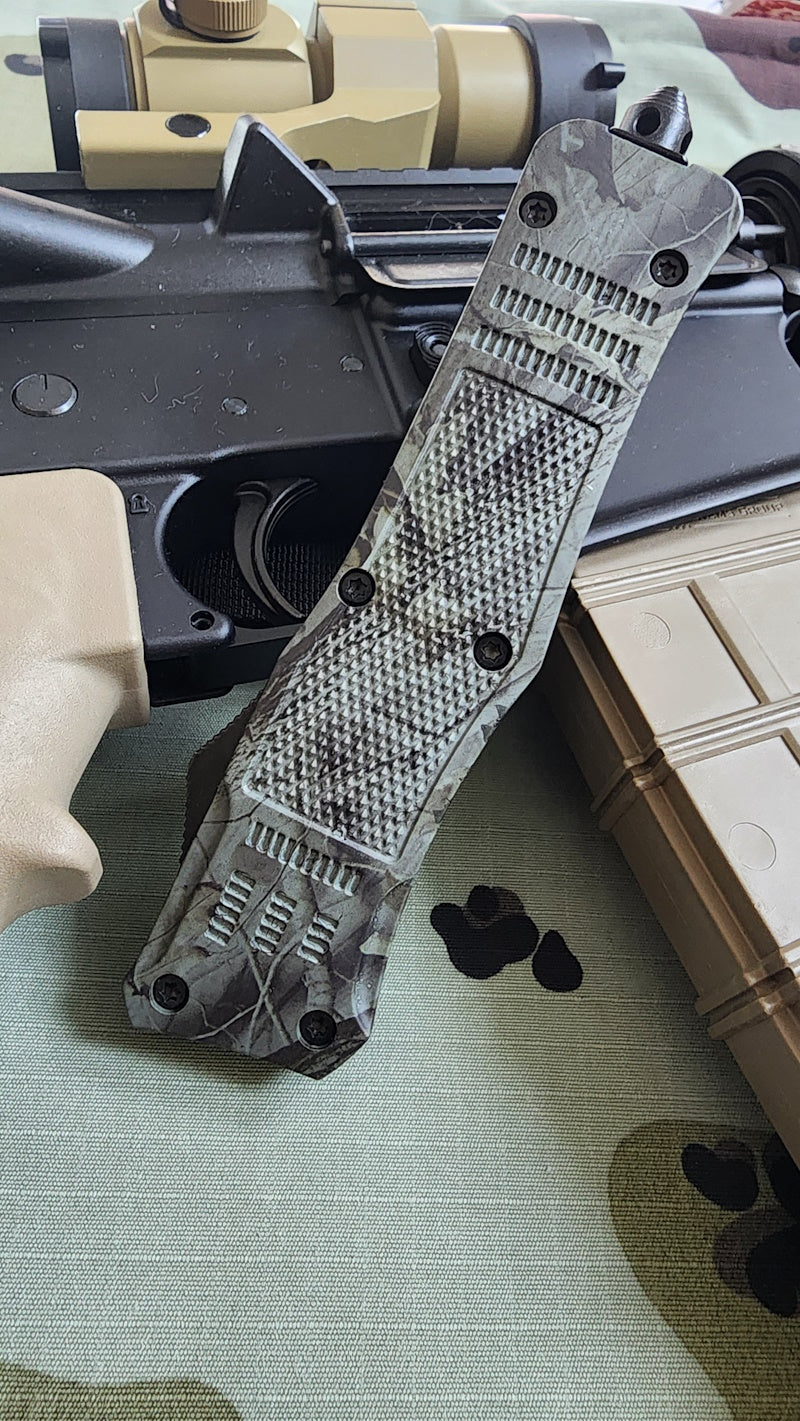 Venom 4TR-E ULTRA OTF Knife in Woodland Camo, black double edge blade, 3.4 inch tactical knife