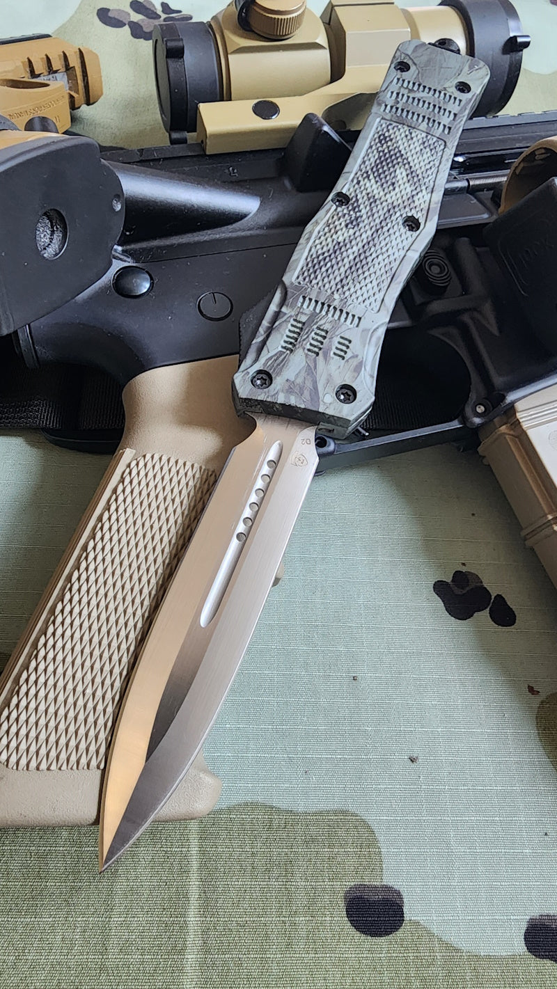 Venom 4TR-E ULTRA OTF knife in woodland camo, satin double edge blade, durable and tactical design