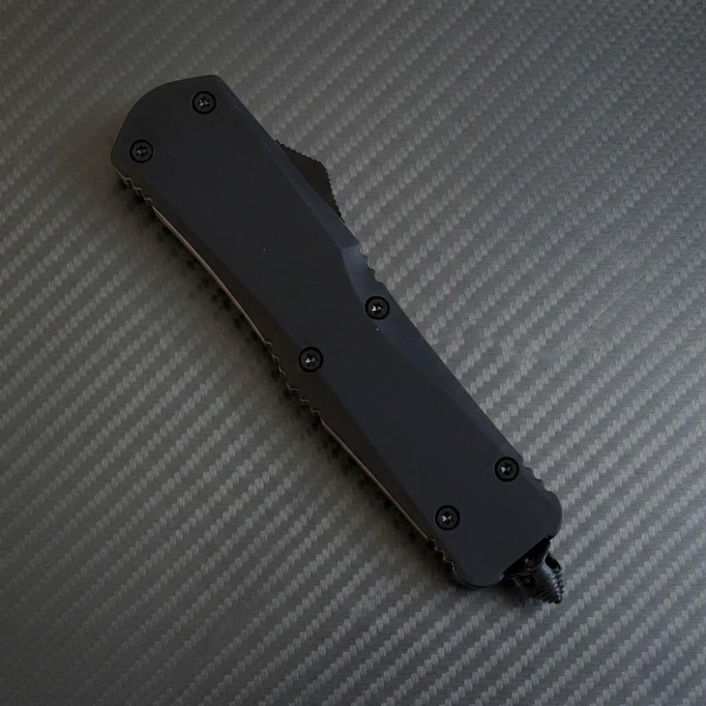 Venom S1 Delta D/A Automatic OTF Knife in sleek black DP finish, a luxury blend of precision and elegance