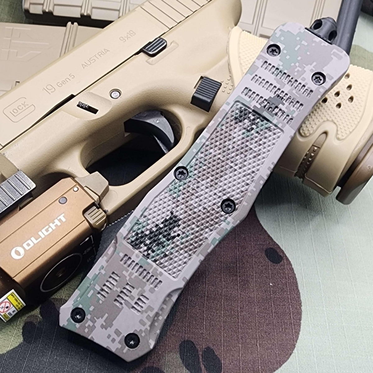 Venom 4TR ELITE Tactical OTF knife in Recon Camo with Satin DE blade, ideal for tactical and outdoor use
