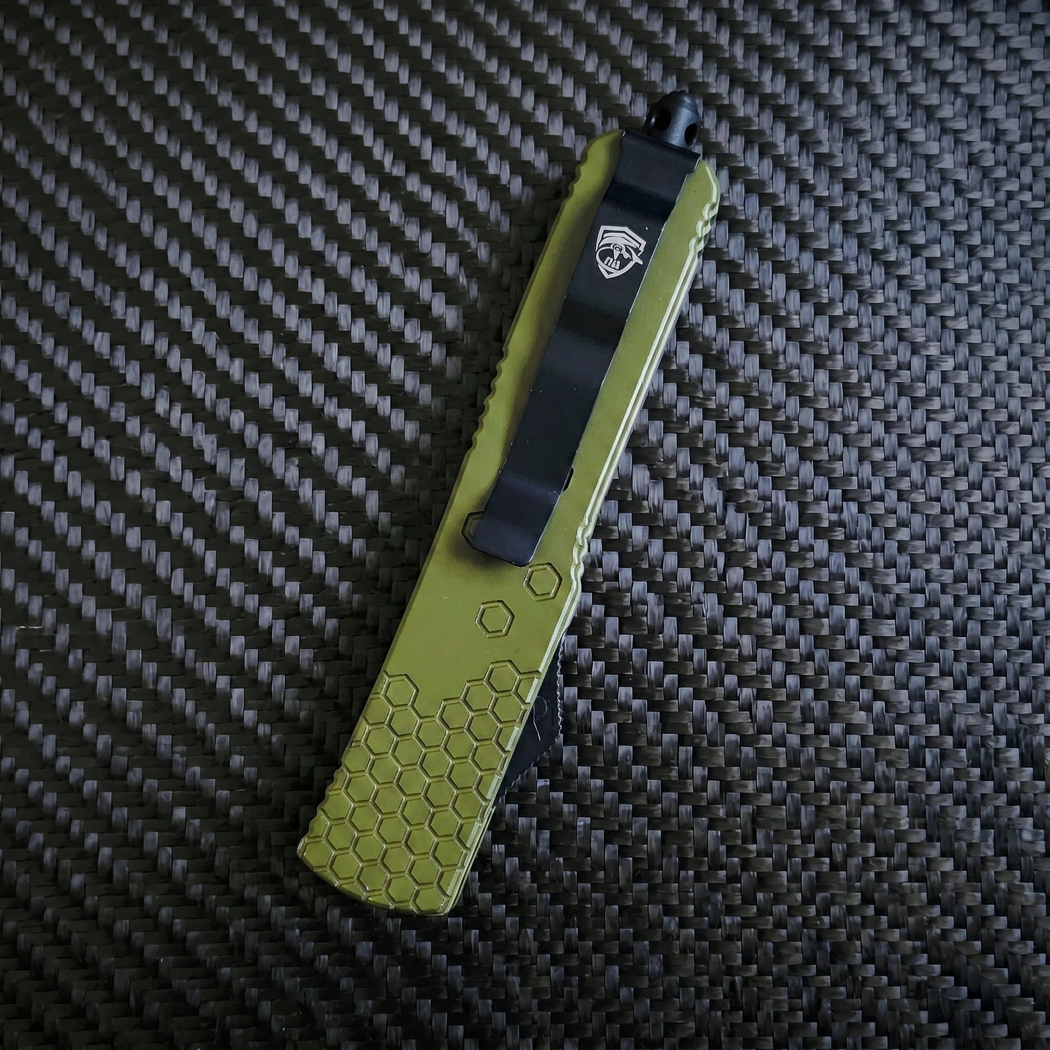 Venom Hex Force OTF knife in OD Satin Spartan 3.25 showcasing luxury design, precision craftsmanship, and unique venom-inspired aesthetics